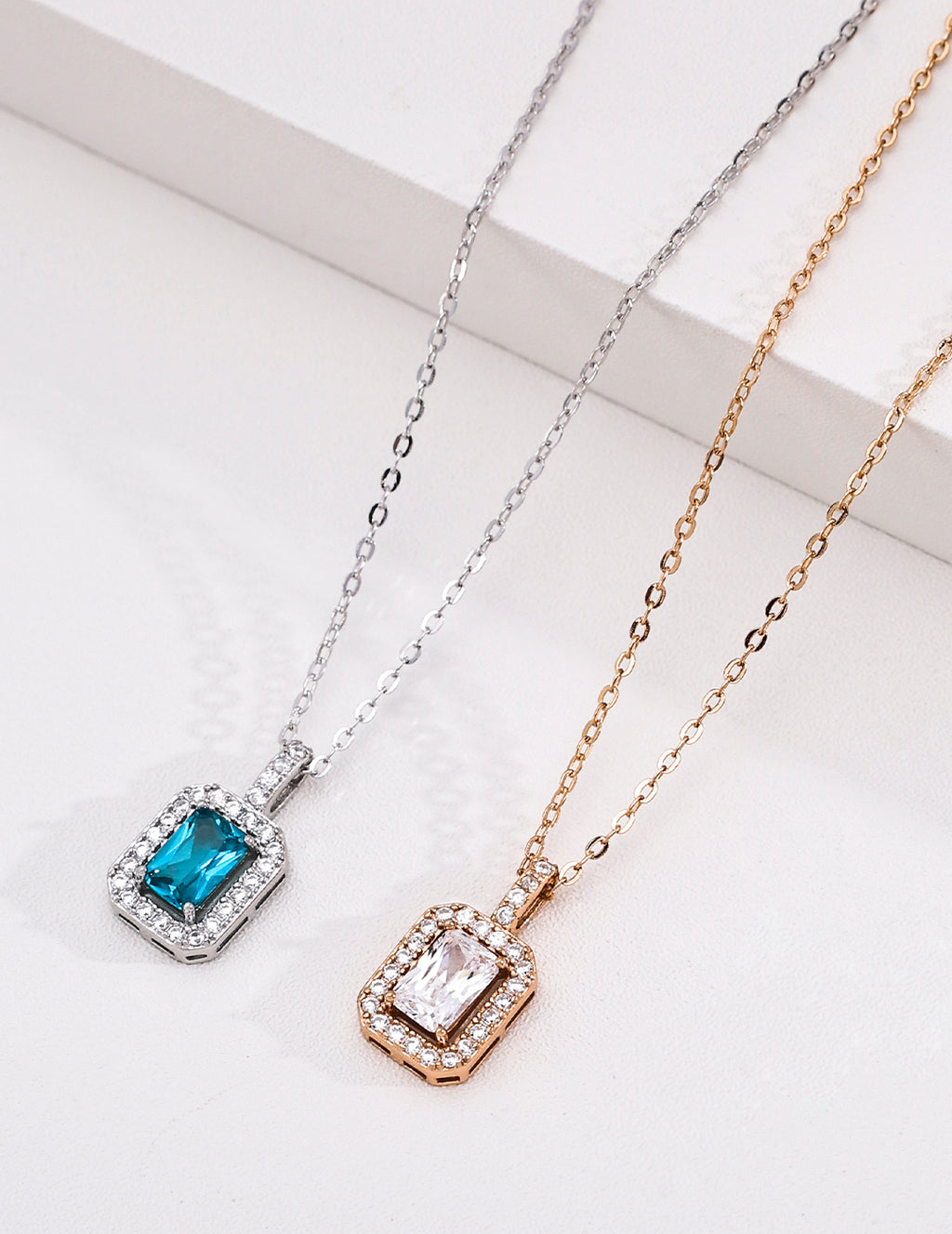 Art Deco Emerald-Cut Halo S925 Necklace - Pair Flat Lay