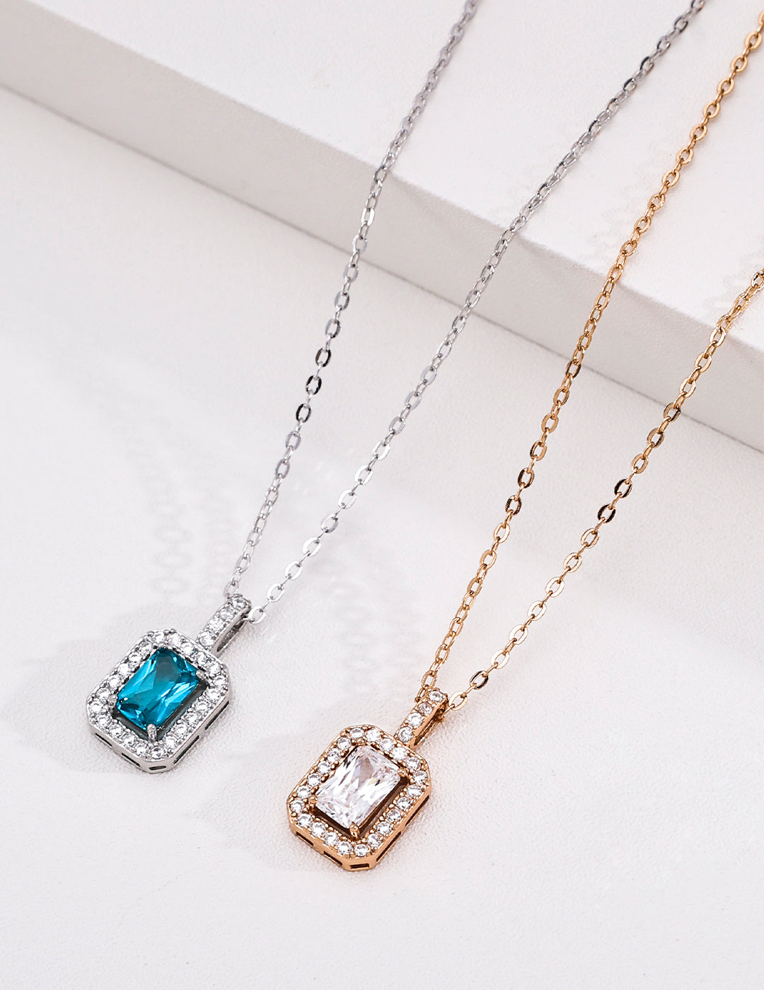 Art Deco Emerald-Cut Halo S925 Necklace - Pair Flat Lay
