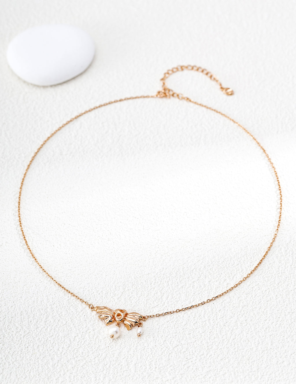 Sculptural Fluid Bow Pearl S925 Necklace - Full Strand Flat Lay