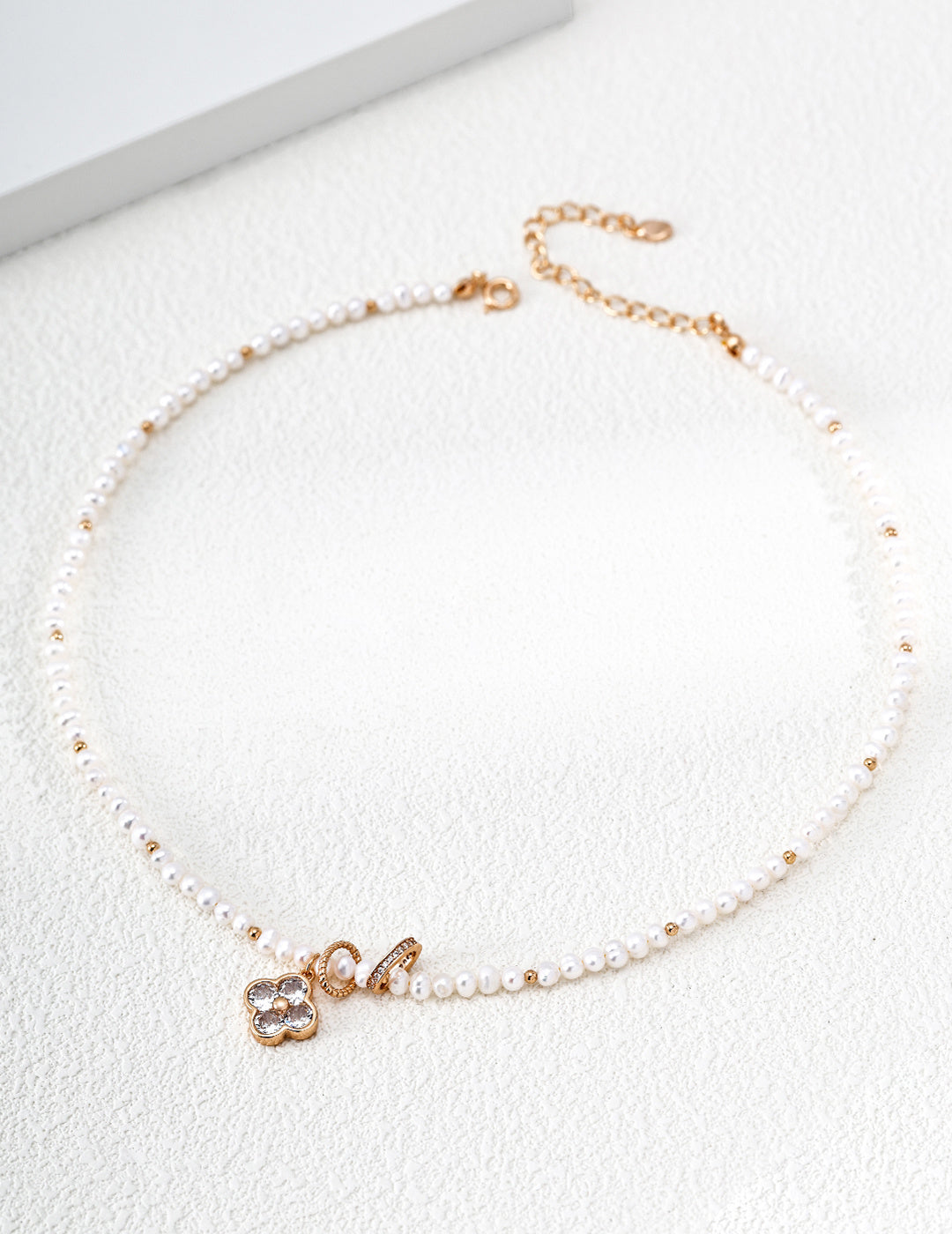 "Fourfold Fortune" Clover Pearl S925 Necklace - Full Strand Flat Lay