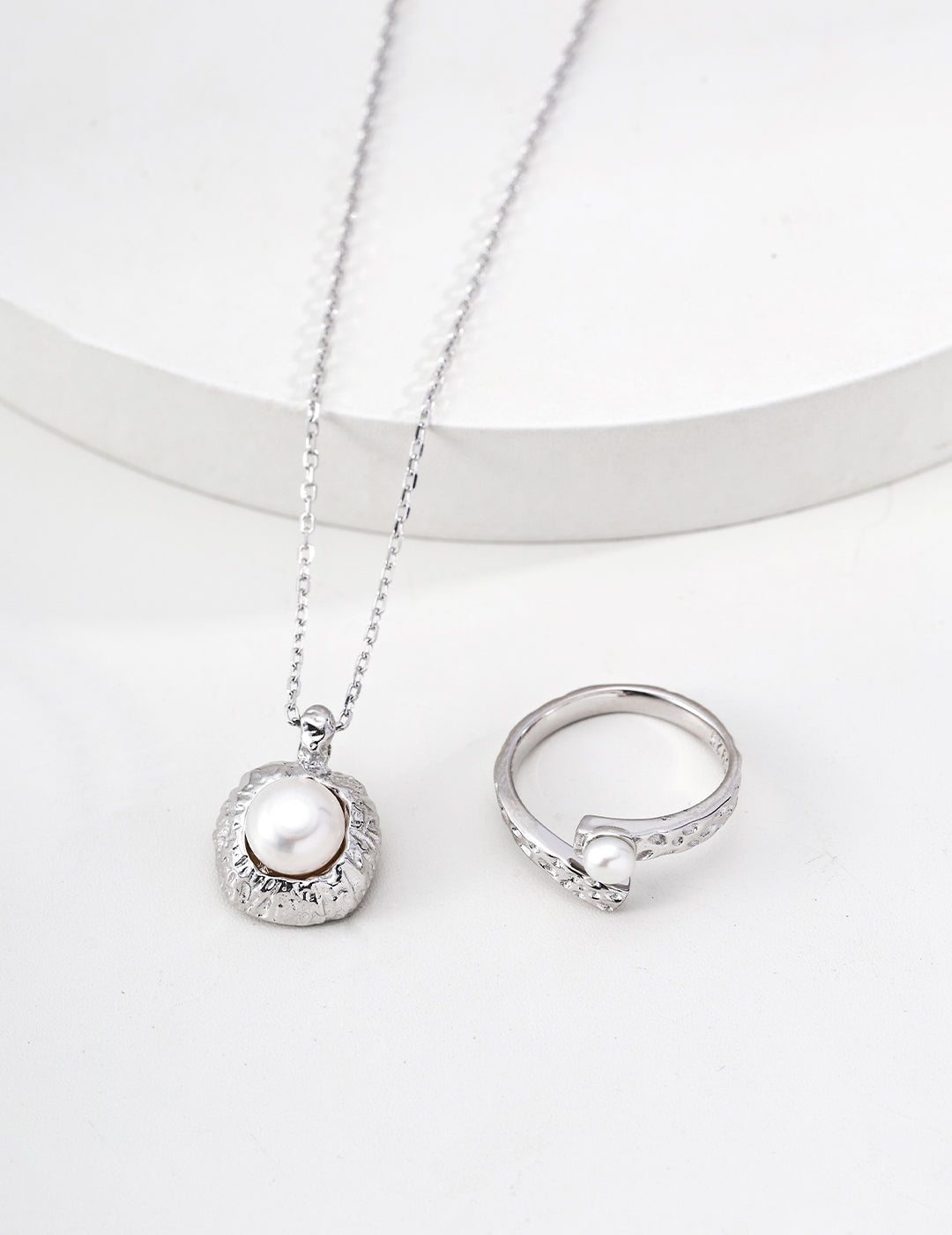 "Chiseled Rock" Pearl Medallion Necklace - Silver Ring Suite