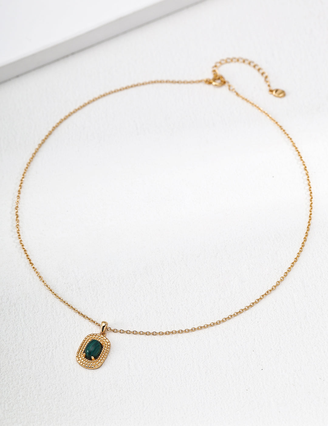 "Woven Rattan" Malachite Medallion Necklace - Malachite Flat Lay